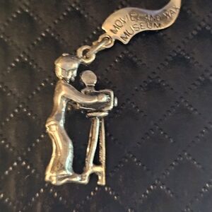 Silver Filmmaker Charm Pendant